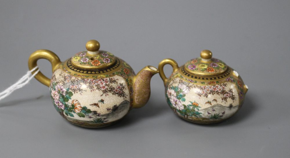 A Satsuma miniature teapot and matching sugar bowl, decorated with geisha in gardens, teapot length 7.5cm height 4.5cm